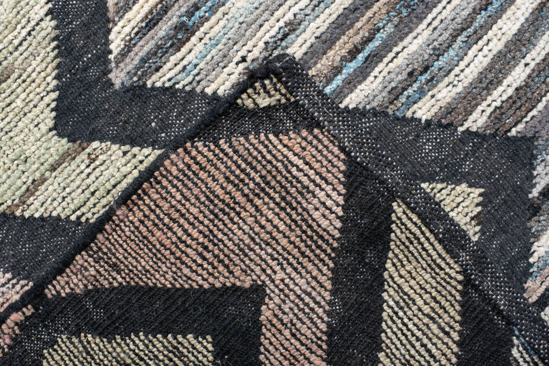13' x 16' one-of-a-kind handmade vintage Tulu oversize rug. Color palette: ivory, charcoal, blush, pale blue, sage, taupe