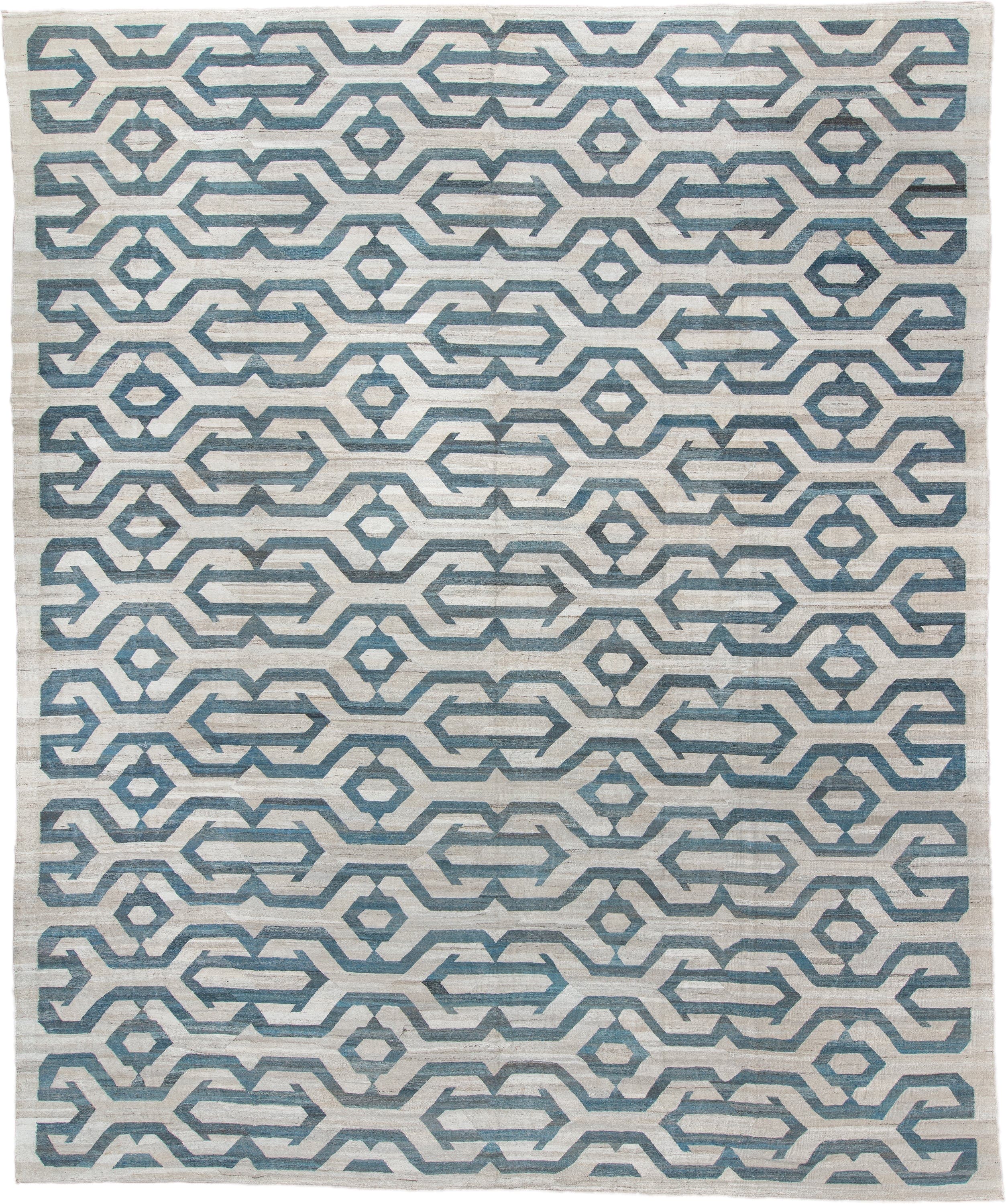 13' x 17' one-of-a-kind handmade vintage Kilim oversize rug. Color palette: ivory, sky blue, slate blue, cream, taupe
