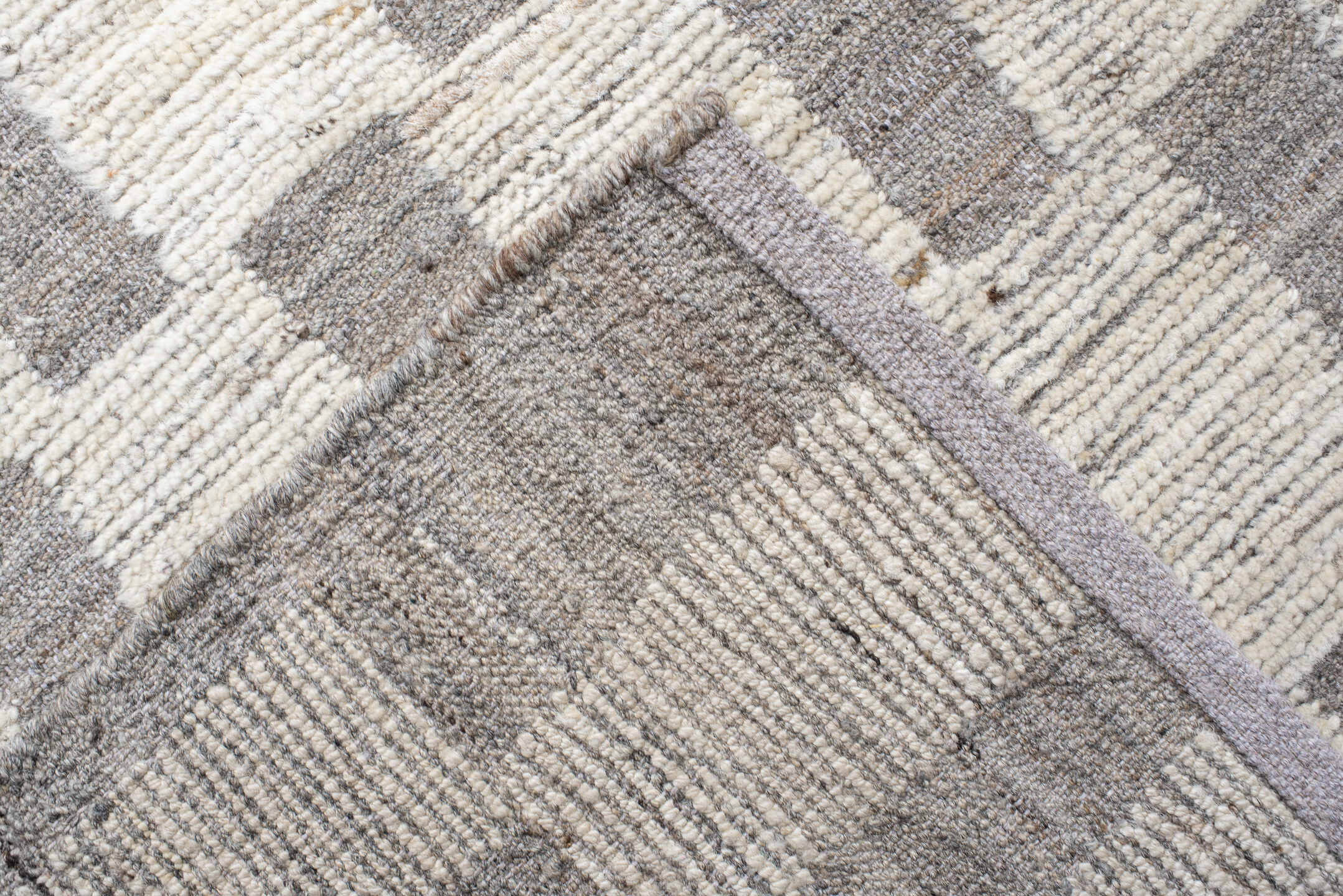 12' x 19' one-of-a-kind handmade vintage Tulu oversize rug. Color palette: ivory, taupe, gray, cream, beige