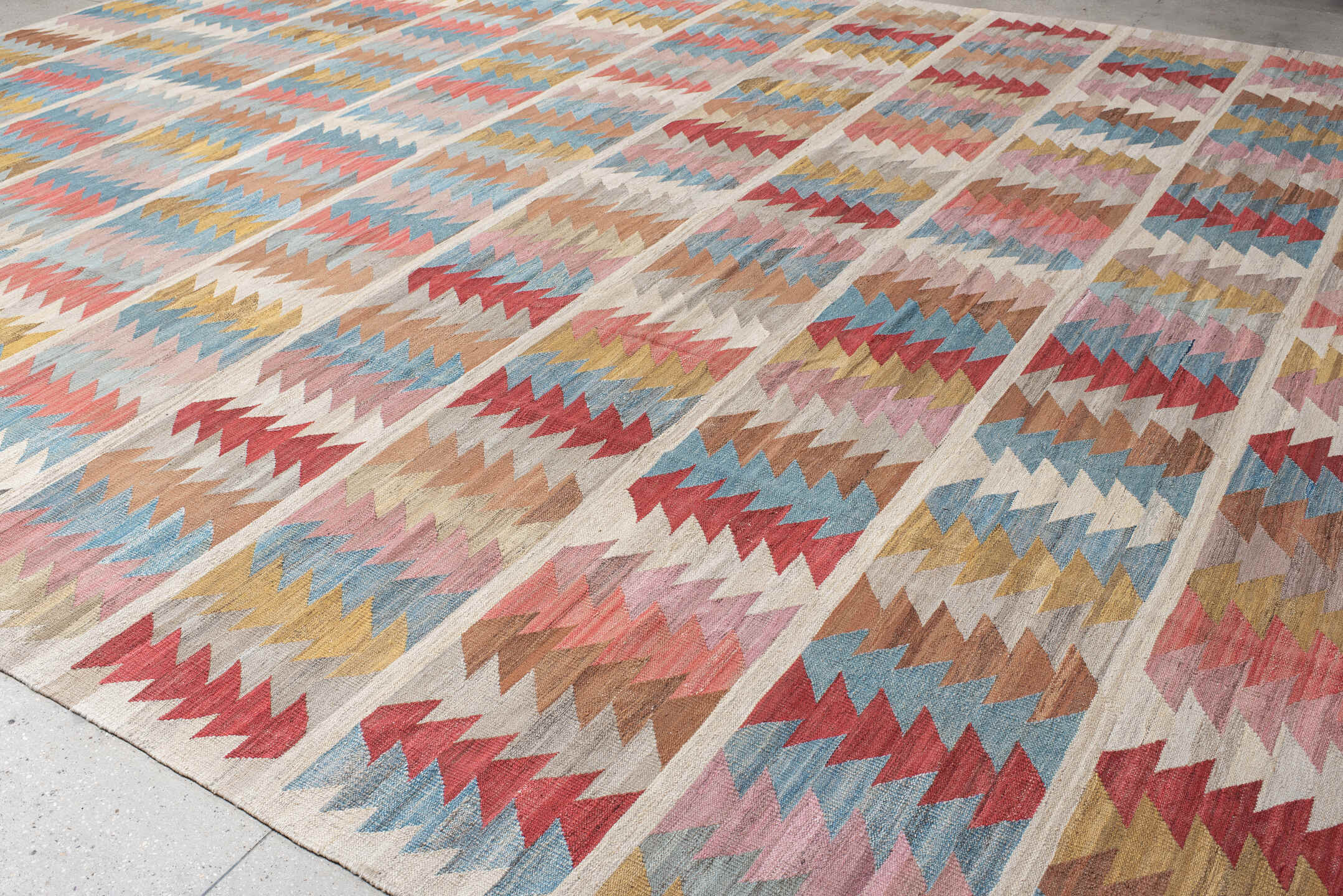 14' x 17' one-of-a-kind handmade vintage Kilim oversize rug. Color palette: ivory, sky_blue, rose, coral, gold, taupe