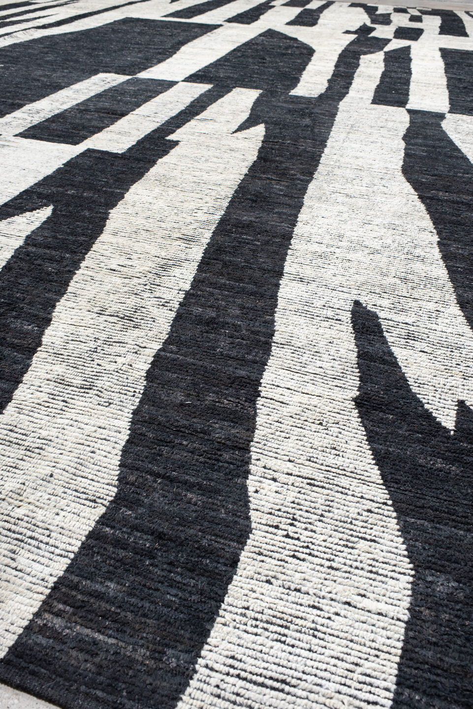 14' x 20' one-of-a-kind handmade vintage Tulu oversize rug. Color palette: ivory, charcoal, black, gray