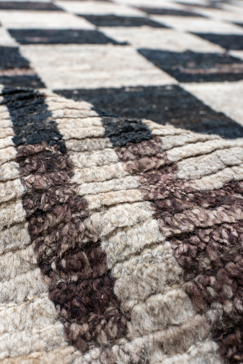 11' x 12' one-of-a-kind handmade vintage Tulu oversize rug. Color palette: ivory, charcoal, taupe, brown, gray, black, beige