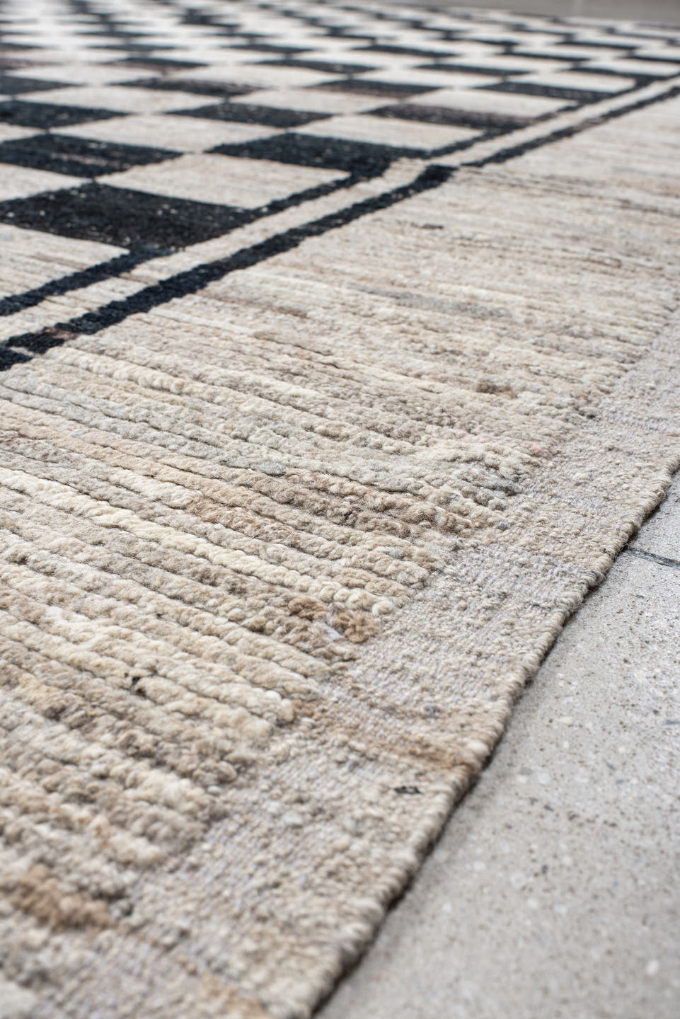 11' x 12' one-of-a-kind handmade vintage Tulu oversize rug. Color palette: ivory, charcoal, taupe, brown, gray, black, beige