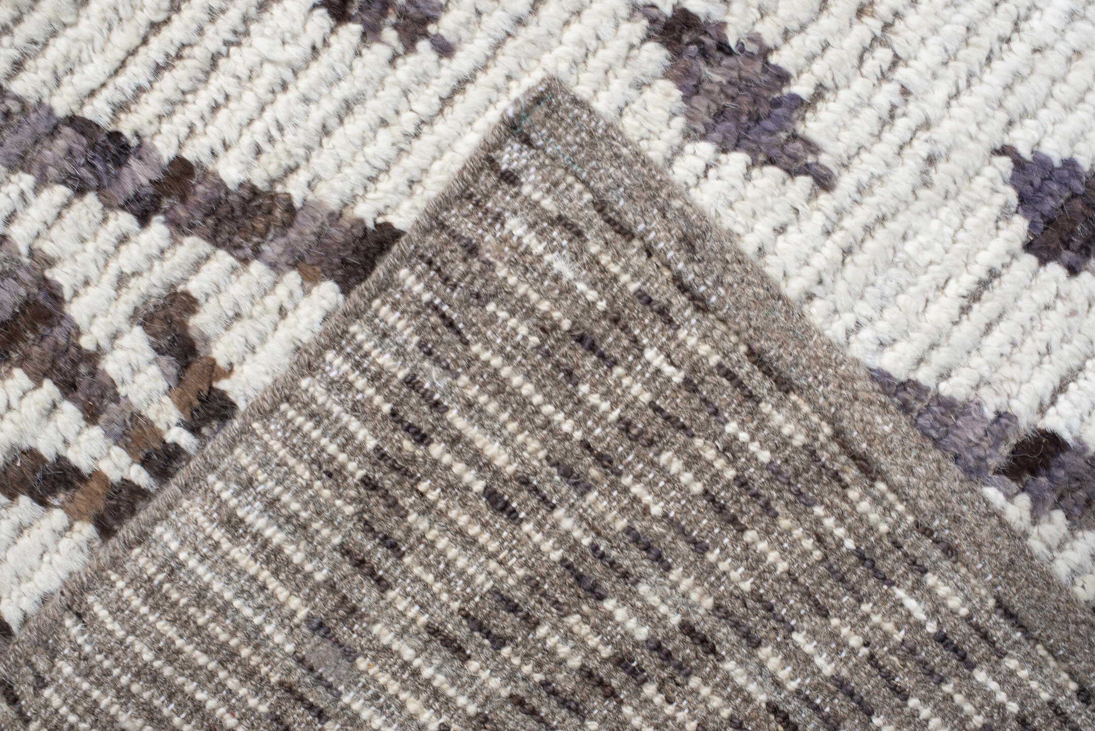 12' x 15' one-of-a-kind handmade vintage Tulu oversize rug. Color palette: ivory, charcoal, taupe, brown, gray, black, beige