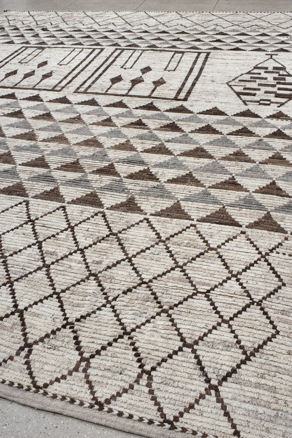 12' x 15' one-of-a-kind handmade vintage Tulu oversize rug. Color palette: ivory, brown, gray, taupe, beige