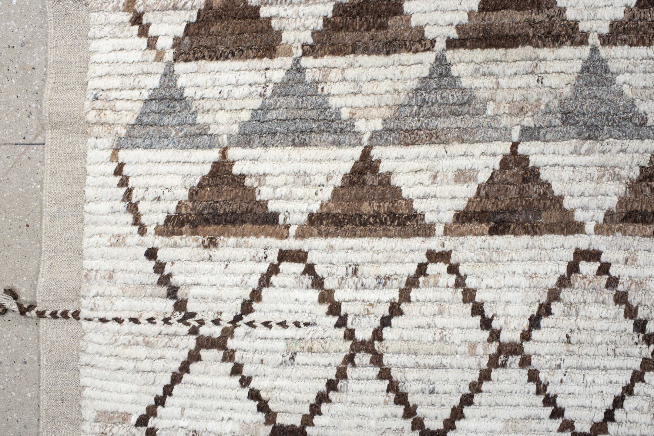 12' x 15' one-of-a-kind handmade vintage Tulu oversize rug. Color palette: ivory, brown, gray, taupe, beige