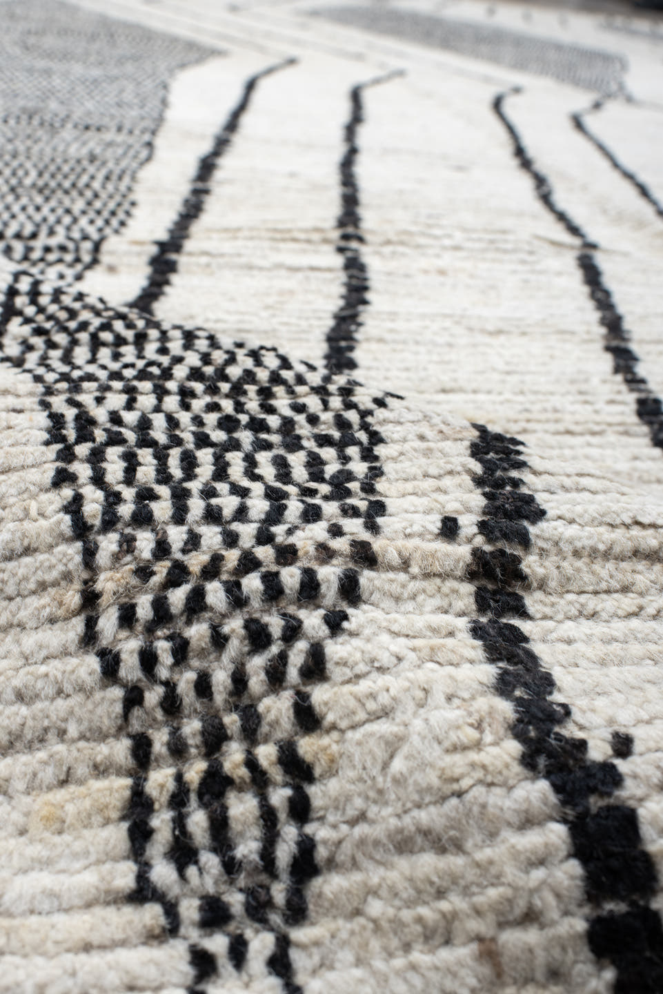 13' x 15' one-of-a-kind handmade vintage Tulu oversize rug. Color palette: ivory, charcoal, gray, black