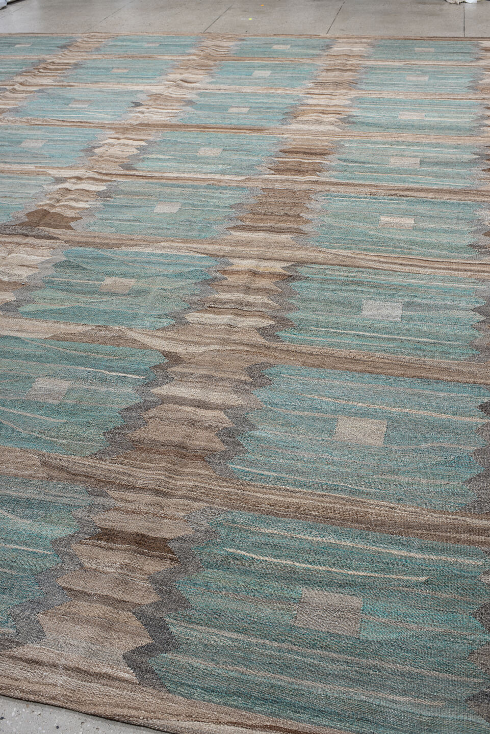 13' x 16' one-of-a-kind handmade vintage Kilim oversize rug. Color palette: taupe, aqua, beige, brown, gray, ivory, teal
