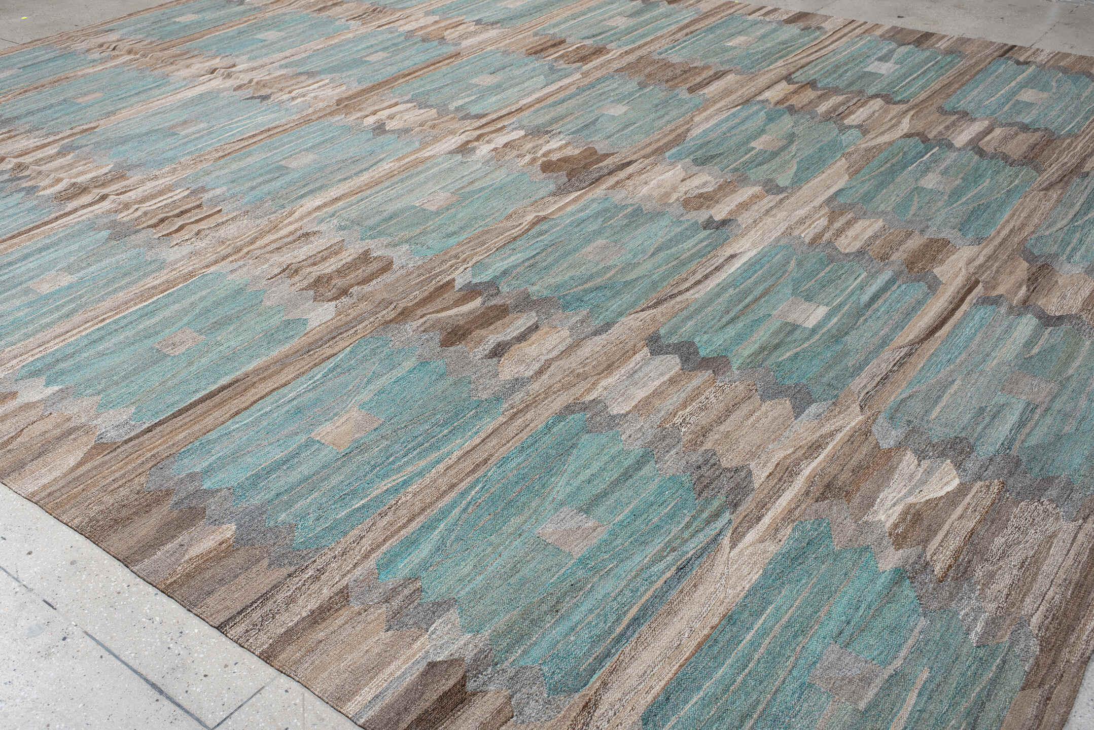 13' x 16' one-of-a-kind handmade vintage Kilim oversize rug. Color palette: taupe, aqua, beige, brown, gray, ivory, teal