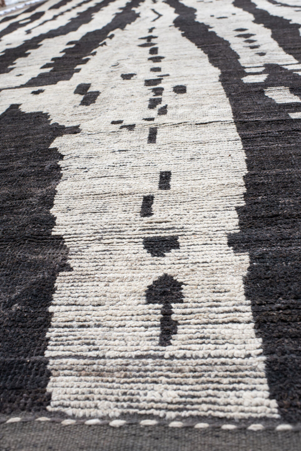 19' x 25' one-of-a-kind handmade vintage Tulu oversize rug. Color palette: ivory, charcoal, taupe, slate, gray, black, beige