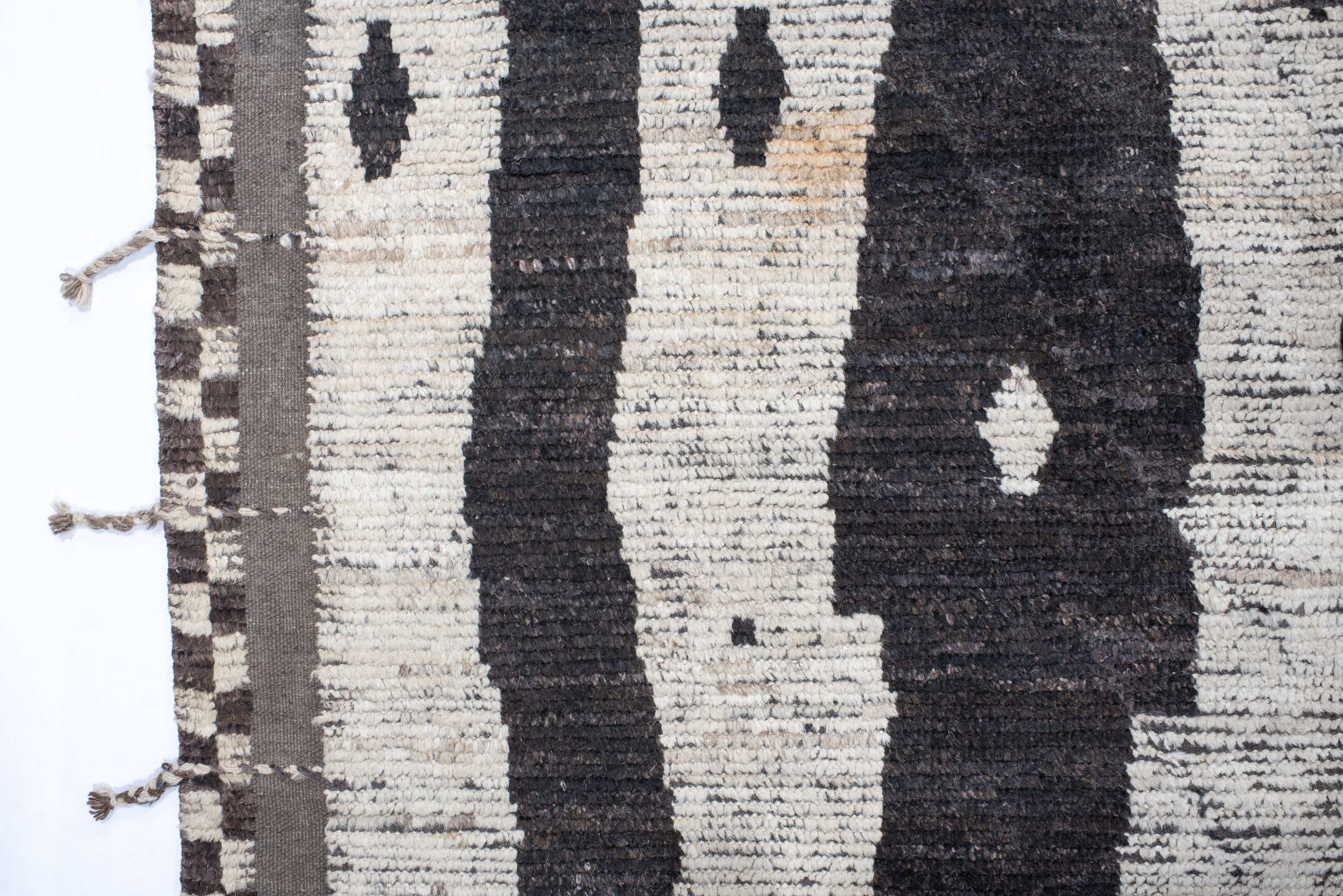 19' x 25' one-of-a-kind handmade vintage Tulu oversize rug. Color palette: ivory, charcoal, taupe, slate, gray, black, beige