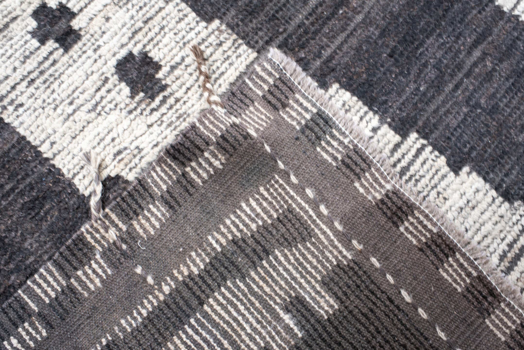 19' x 25' one-of-a-kind handmade vintage Tulu oversize rug. Color palette: ivory, charcoal, taupe, slate, gray, black, beige