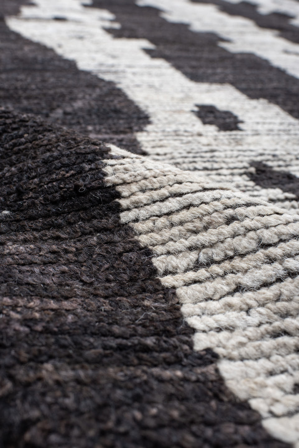 19' x 25' one-of-a-kind handmade vintage Tulu oversize rug. Color palette: ivory, charcoal, taupe, slate, gray, black, beige