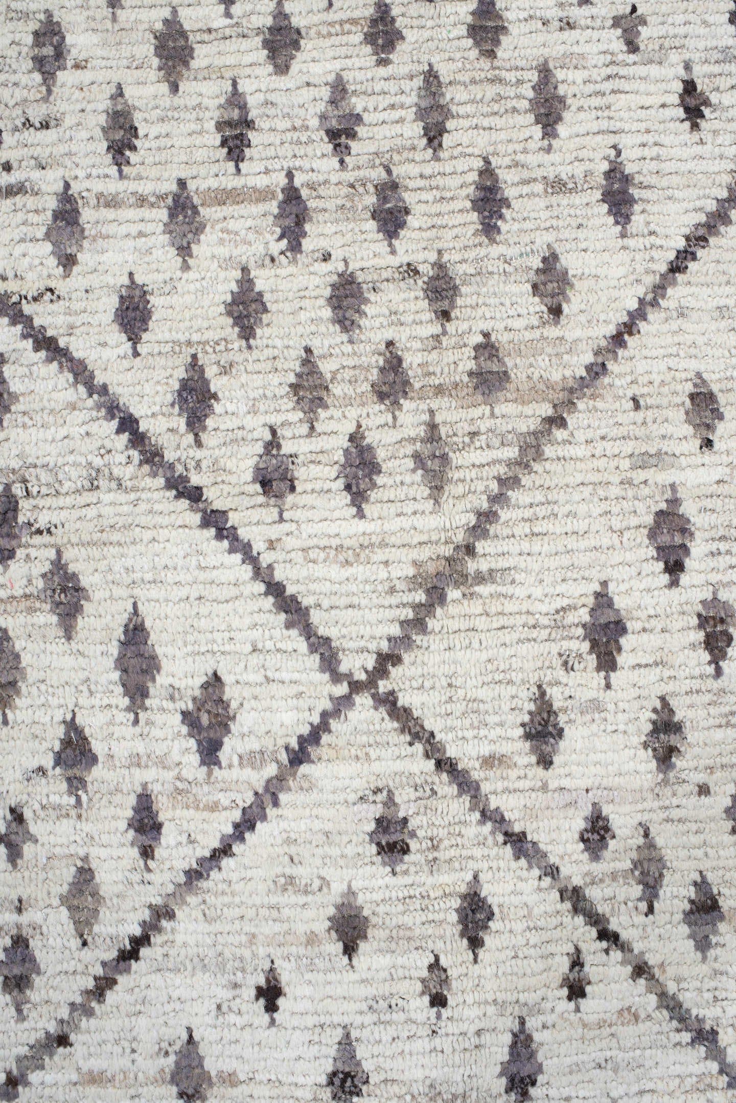 12' x 17' one-of-a-kind handmade vintage Tulu oversize rug. Color palette: ivory, charcoal, taupe, brown, gray, black, beige