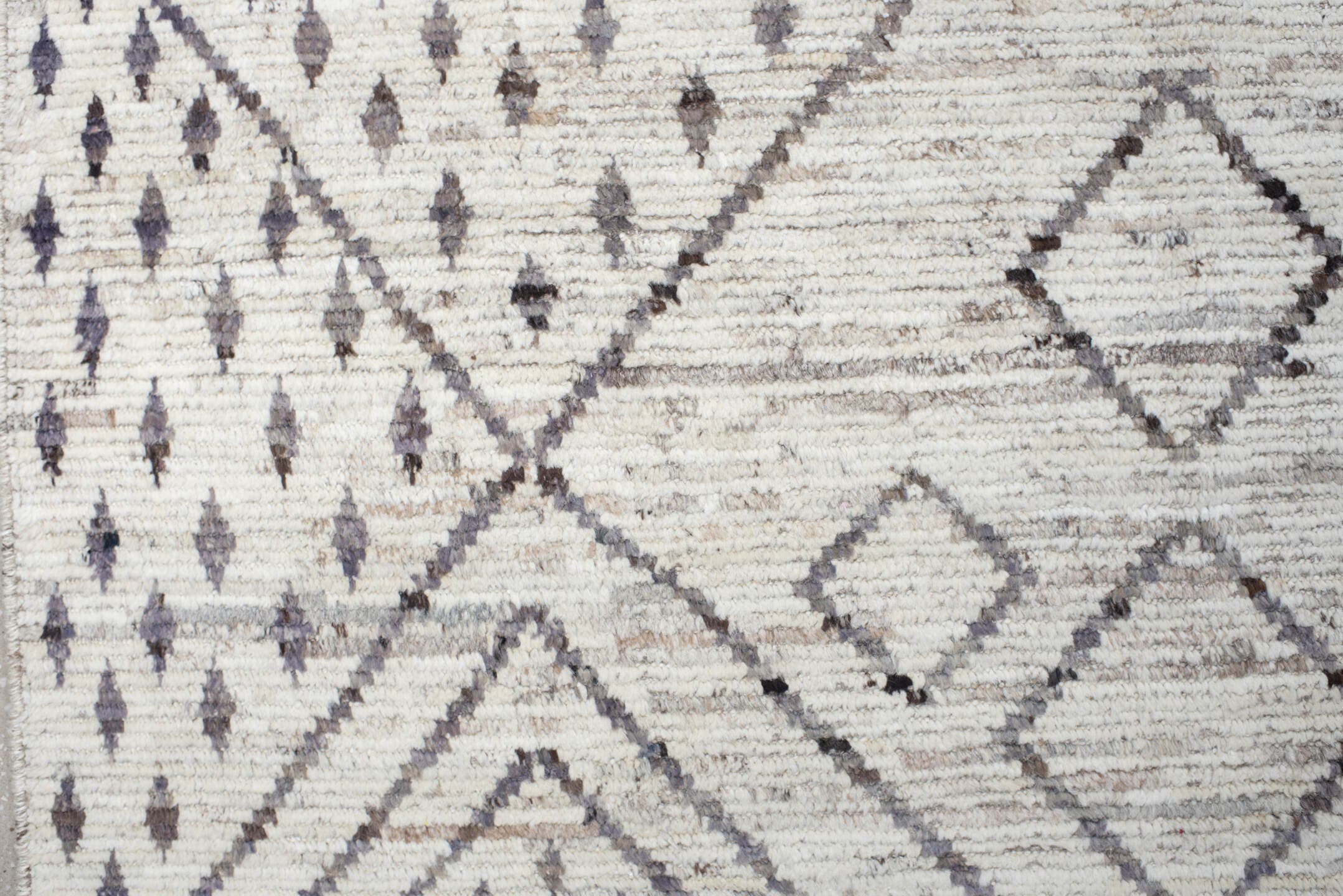 12' x 17' one-of-a-kind handmade vintage Tulu oversize rug. Color palette: ivory, charcoal, taupe, brown, gray, black, beige