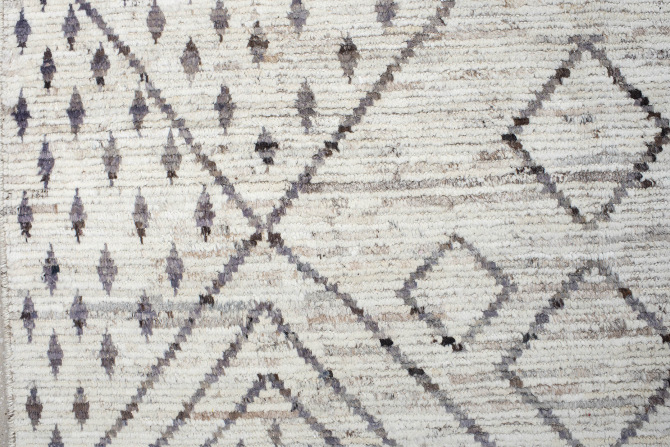 12' x 17' one-of-a-kind handmade vintage Tulu oversize rug. Color palette: ivory, charcoal, taupe, brown, gray, black, beige