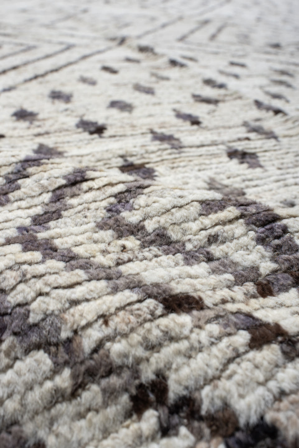 12' x 17' one-of-a-kind handmade vintage Tulu oversize rug. Color palette: ivory, charcoal, taupe, brown, gray, black, beige