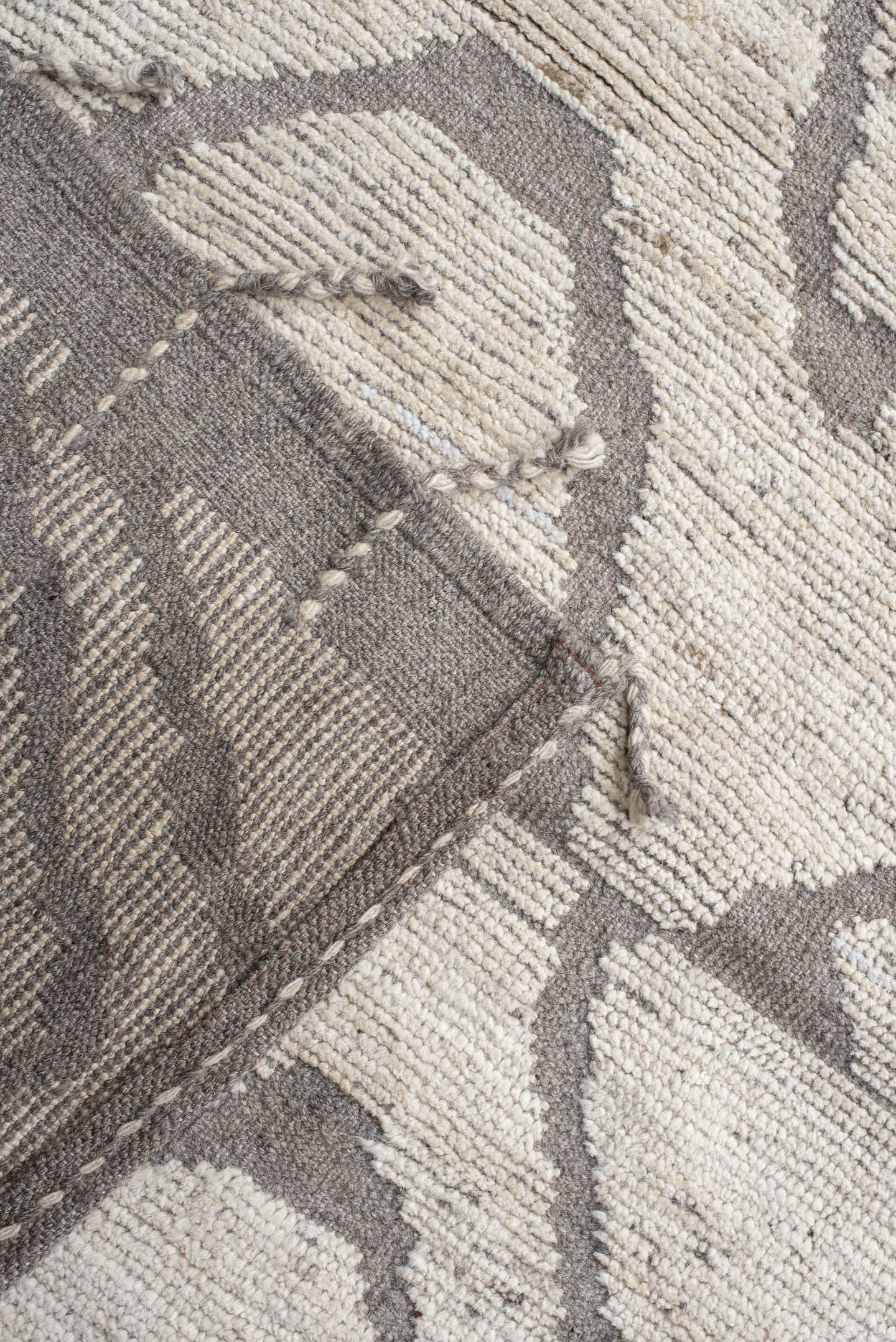 20' x 24' one-of-a-kind handmade vintage Tulu oversize rug. Color palette: ivory, gray, taupe, beige