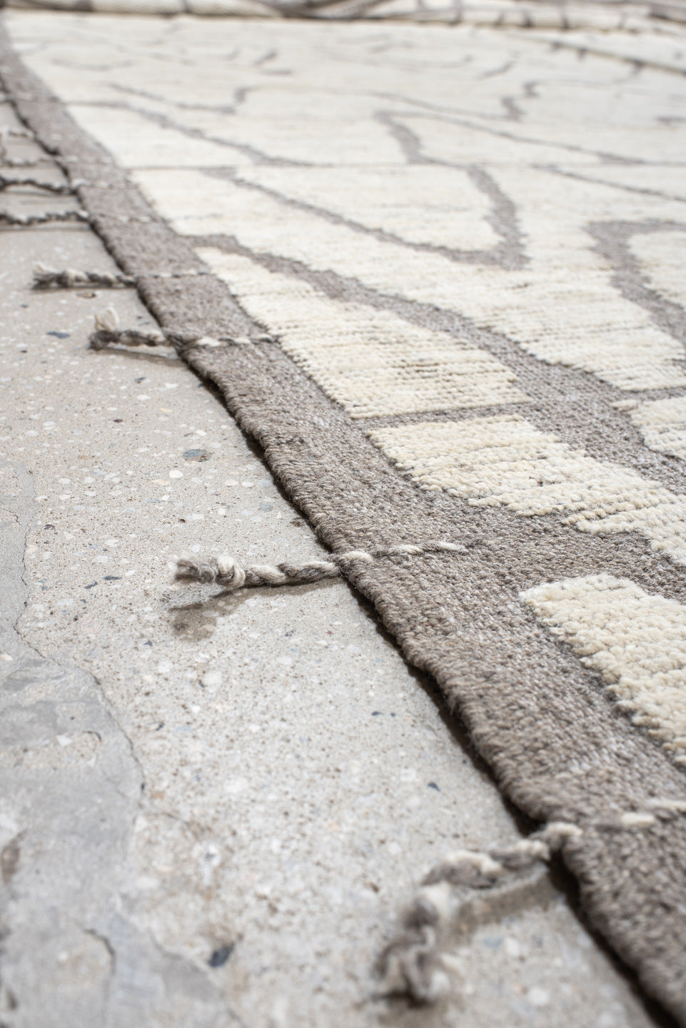20' x 24' one-of-a-kind handmade vintage Tulu oversize rug. Color palette: ivory, gray, taupe, beige