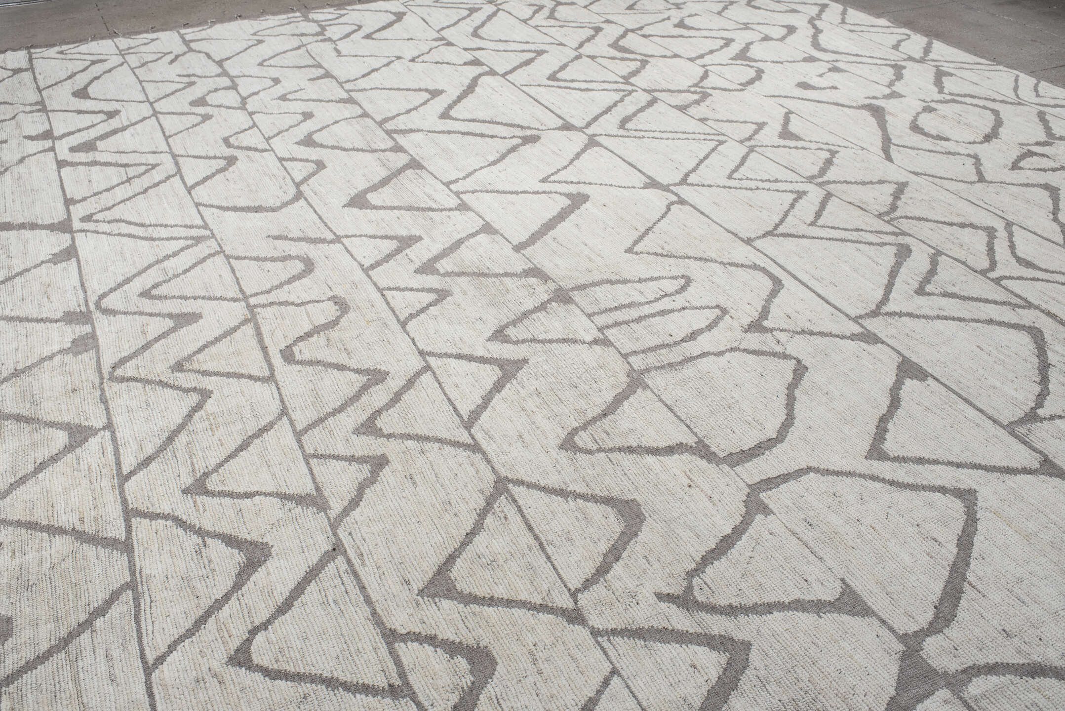 20' x 24' one-of-a-kind handmade vintage Tulu oversize rug. Color palette: ivory, gray, taupe, beige