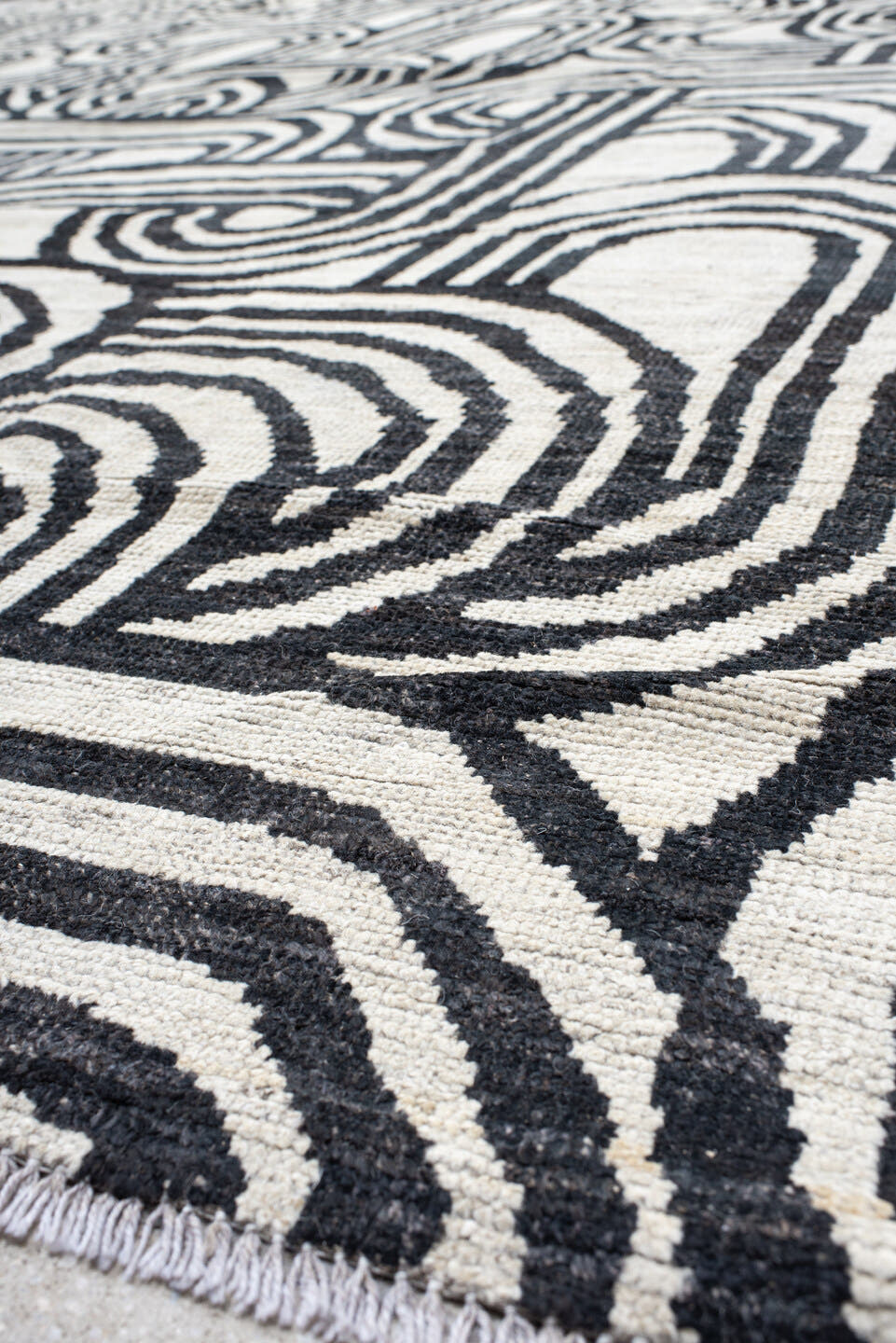 16' x 22' one-of-a-kind handmade vintage Tulu oversize rug. Color palette: ivory, charcoal, gray, black