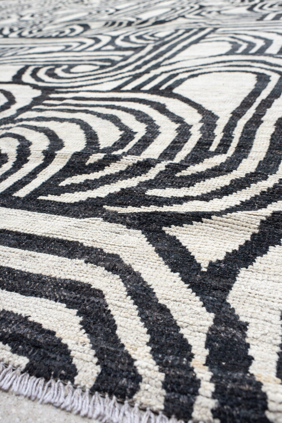 16' x 22' one-of-a-kind handmade vintage Tulu oversize rug. Color palette: ivory, charcoal, gray, black