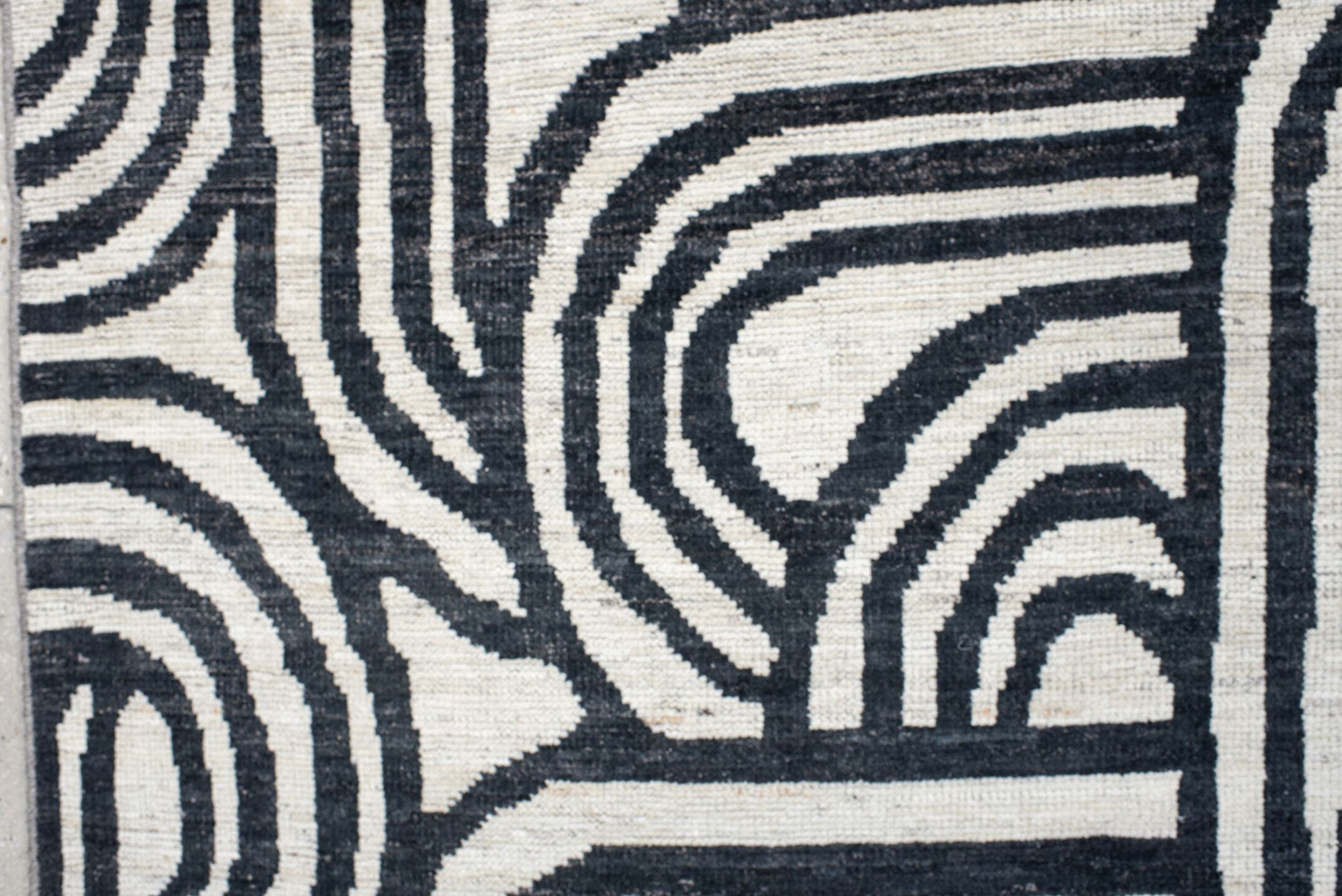 16' x 22' one-of-a-kind handmade vintage Tulu oversize rug. Color palette: ivory, charcoal, gray, black