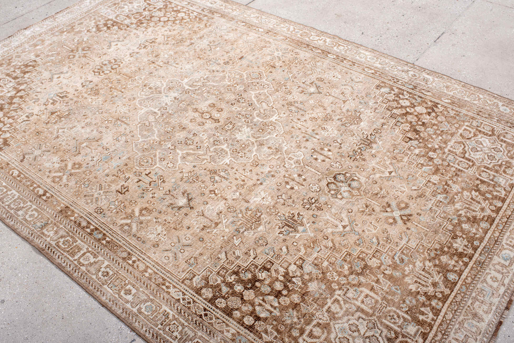 5' x 8' one-of-a-kind handmade vintage Shiraz medium size rug. Color palette: taupe, ivory, camel, beige, light brown