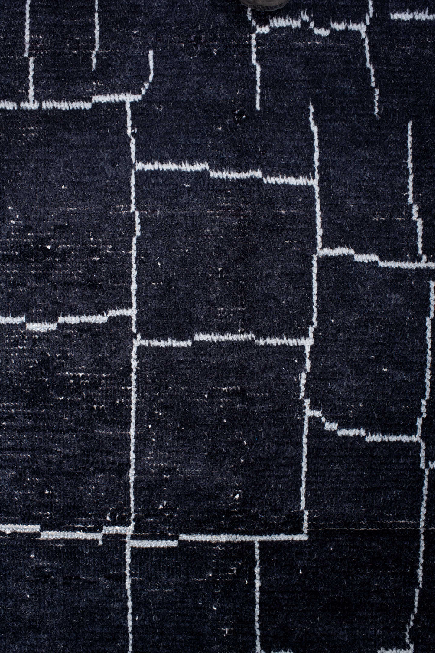 7' x 9' one-of-a-kind handmade vintage Moroccan rug. Color palette: black, blue, gray, lavender, light blue, light gray