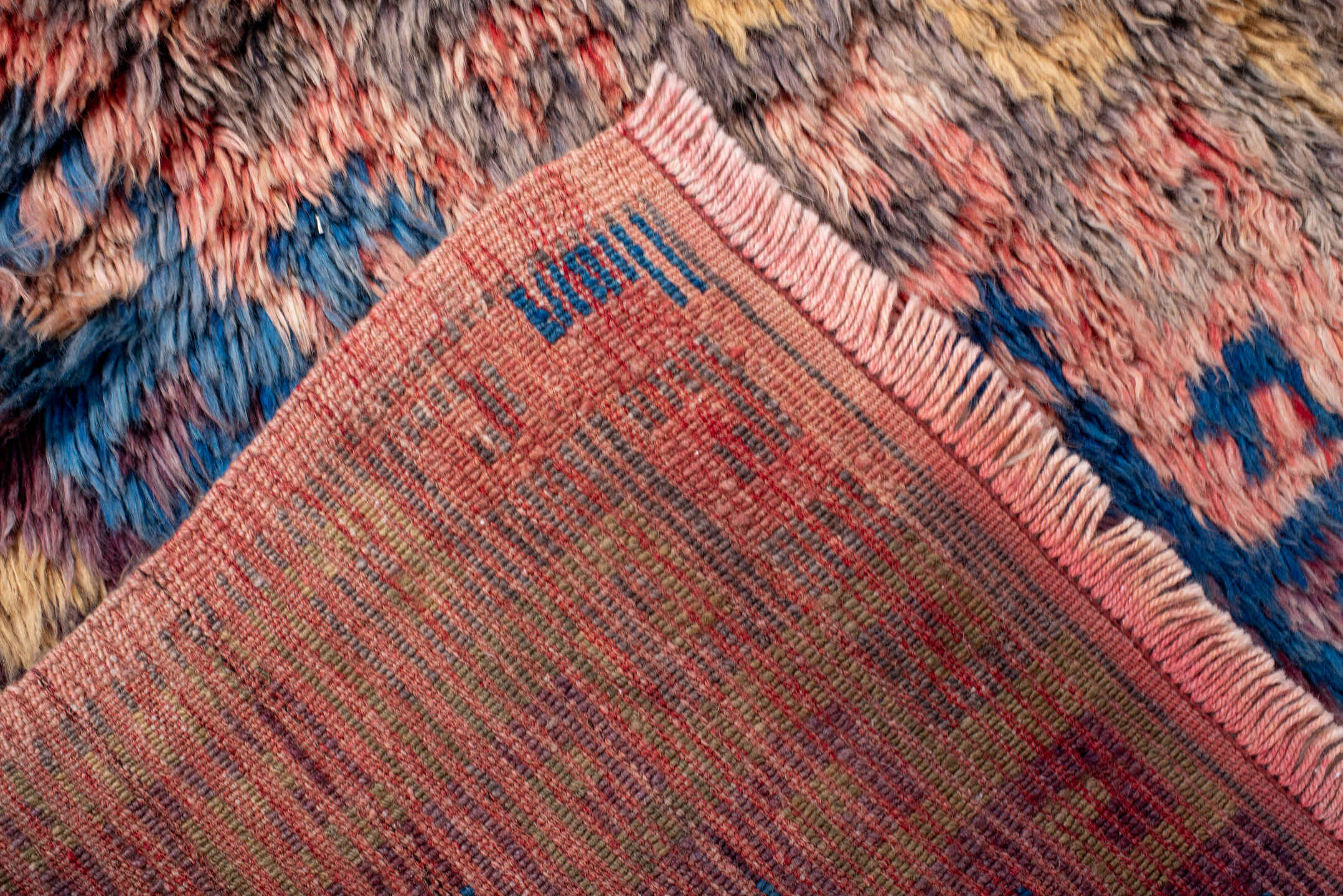 4' x 5' one-of-a-kind handmade vintage Moroccan small size rug. Color palette: pink, brown, gray, blue, red, burlywood