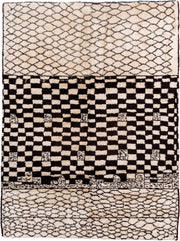 7' x 9' one-of-a-kind handmade vintage Moroccan rug. Color palette: ivory, brown, black, cream