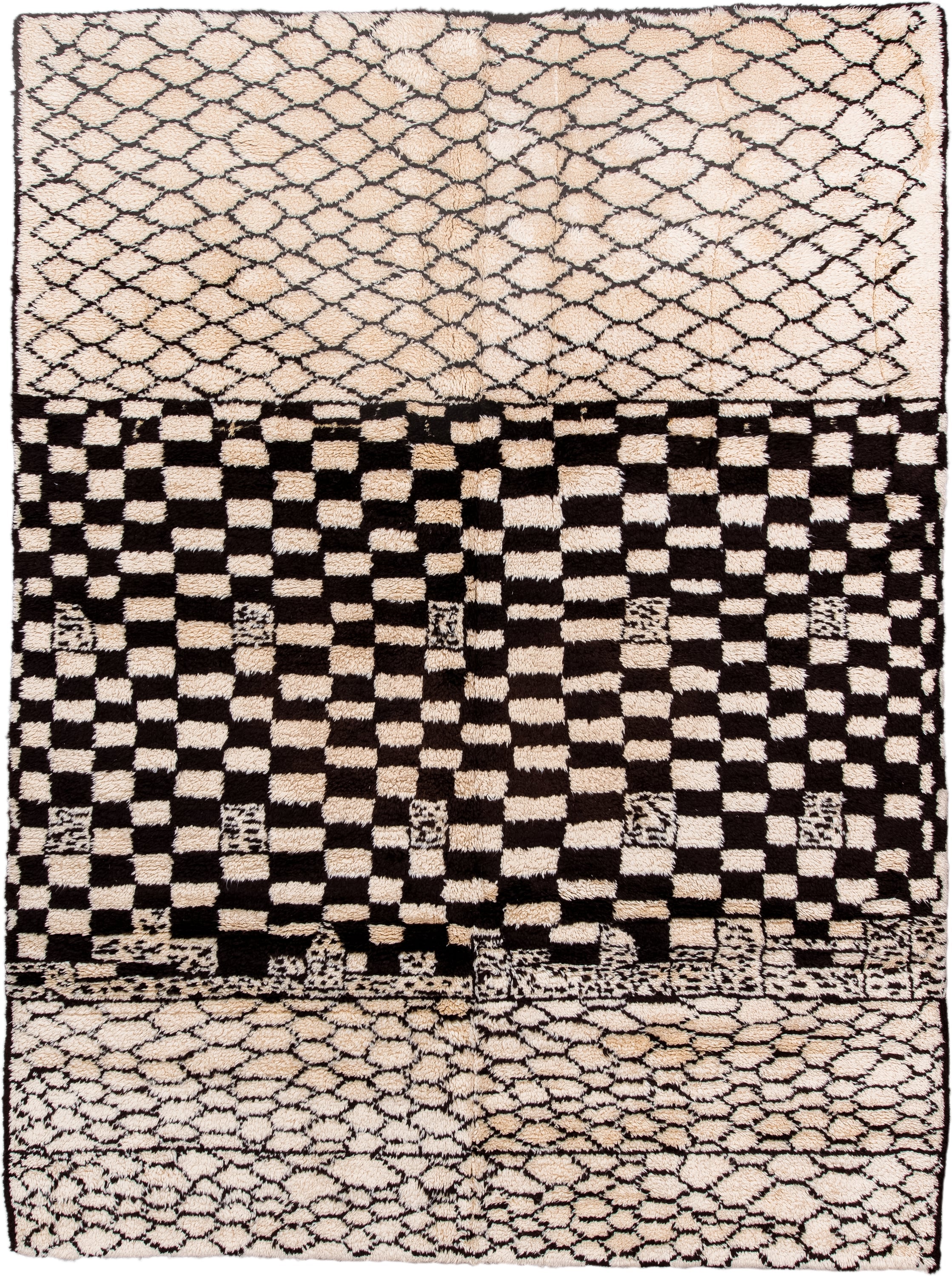 7' x 9' one-of-a-kind handmade vintage Moroccan rug. Color palette: ivory, brown, black, cream