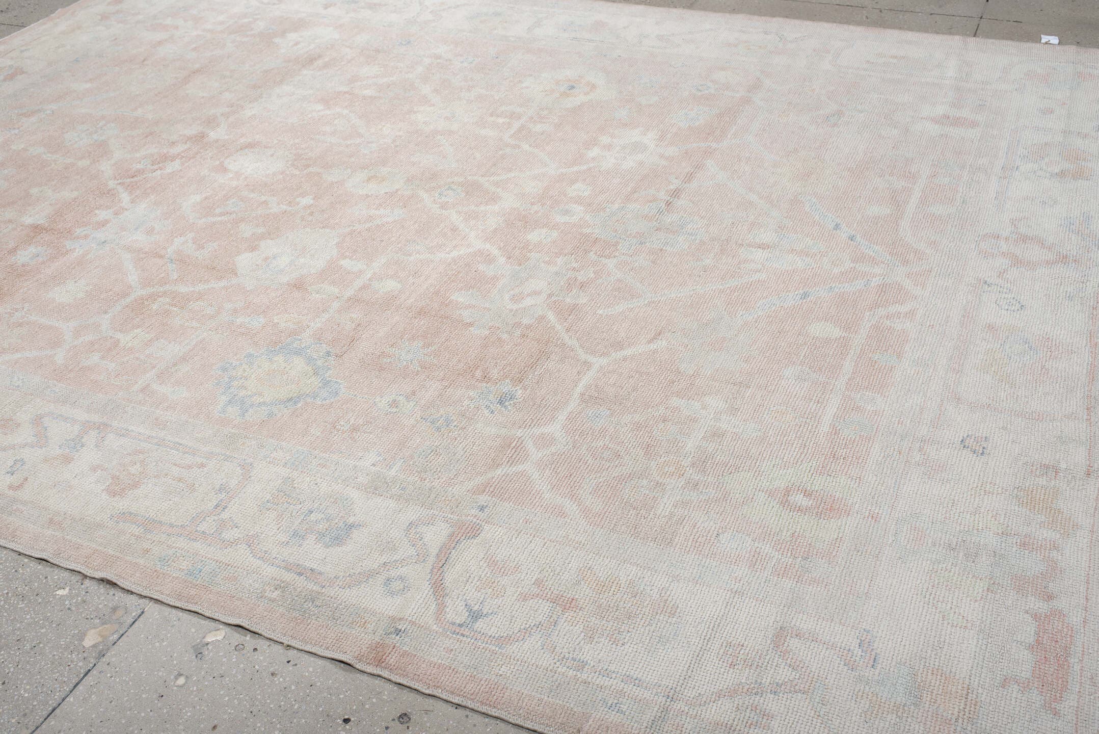 9' x 12' one-of-a-kind handmade vintage Oushak large size rug. Color palette: blush, ivory, cream, pale blue, taupe, peach