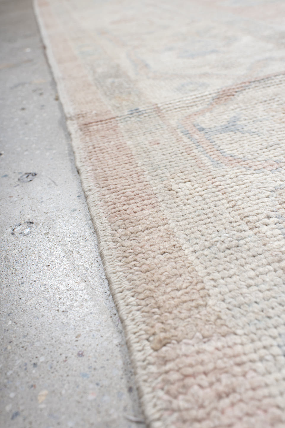 9' x 12' one-of-a-kind handmade vintage Oushak large size rug. Color palette: blush, ivory, cream, pale blue, taupe, peach