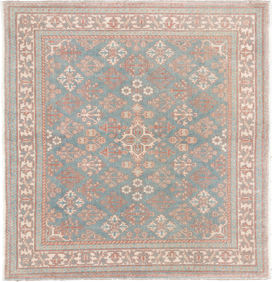 5' x 5' one-of-a-kind handmade antique Joshegan rug. Color palette: blue gray, ivory, coral, peach, sage, taupe, gray, blue