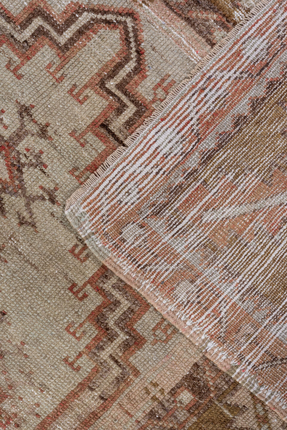 4' x 8' one-of-a-kind handmade vintage Oushak rug. Color palette: brown, gray, light gray, off-white, pink