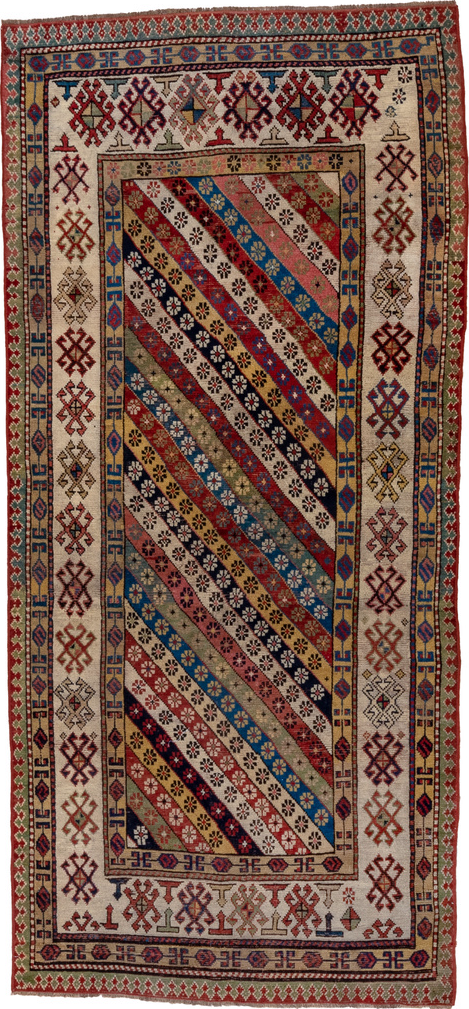 4' x 8' one-of-a-kind handmade vintage Caucasian runner rug. Color palette: black, blue, brown, gray, pink, red