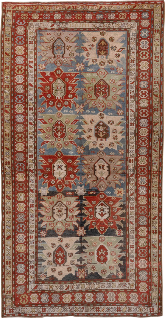 4' x 8' one-of-a-kind handmade vintage Caucasian rug. Color palette: black, brown, gray, light gray, off-white, pink