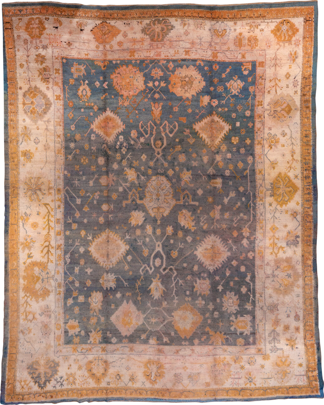 11' x 14' one-of-a-kind handmade vintage Oushak oversize rug. Color palette: blue, brown, gray, off-white, orange, peru
