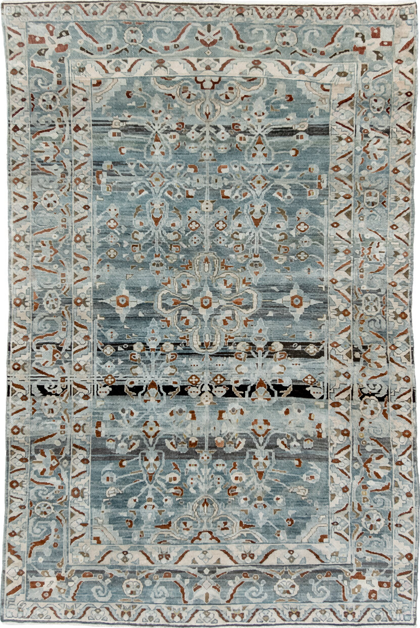 6' x 9' one-of-a-kind handmade vintage Lilian medium size rug. Color palette: black, blue, brown, charcoal, dark gray