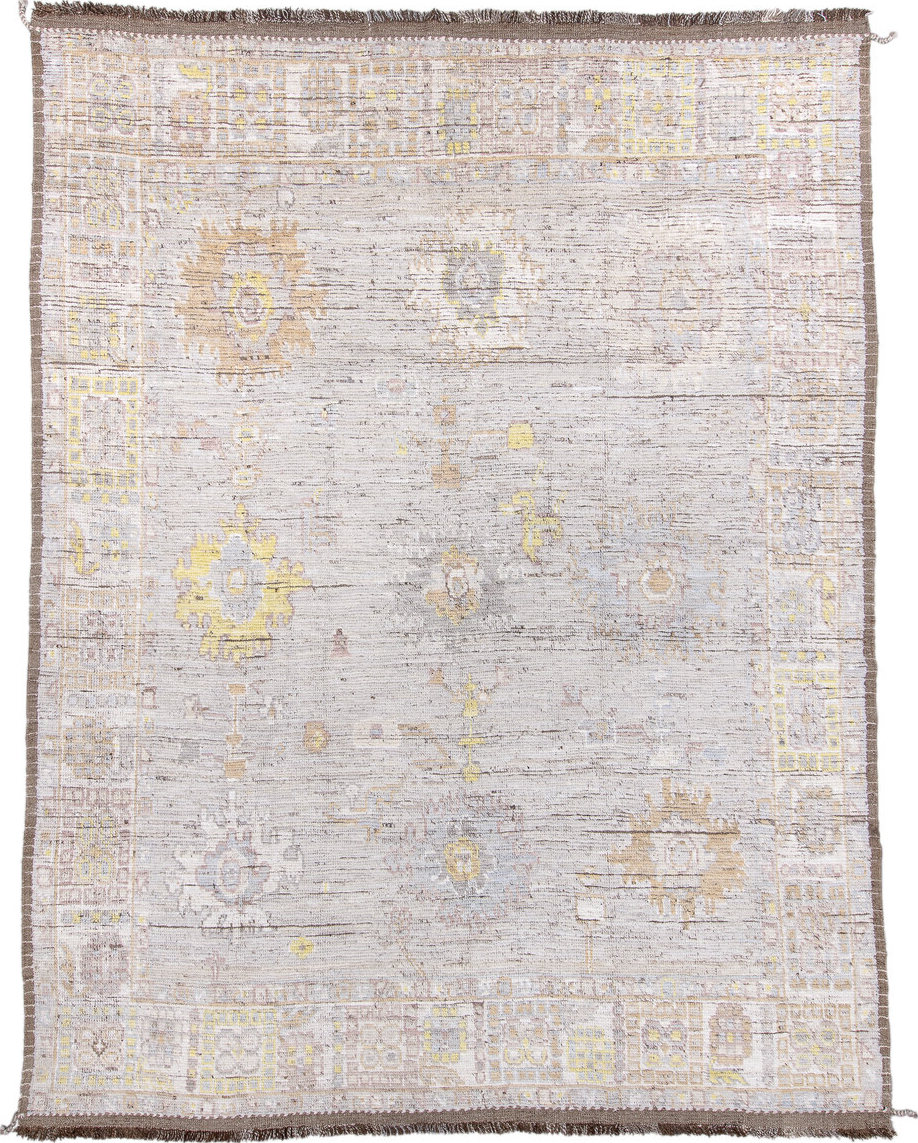 9' x 12' one-of-a-kind handmade vintage Tulu large size rug. Color palette: gray, pink, off-white, light gray, brown, orange