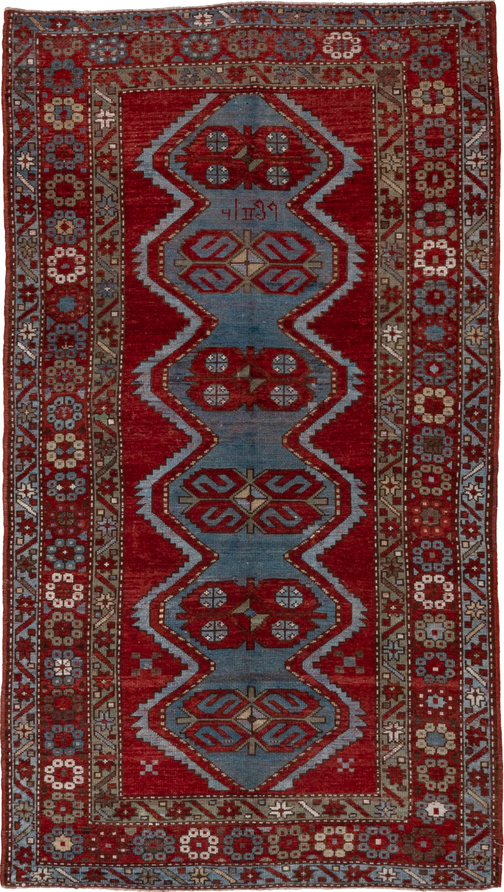 4' x 7' one-of-a-kind handmade vintage Trans Caucasian rug. Color palette: blue, brown, dim gray, gray, pink
