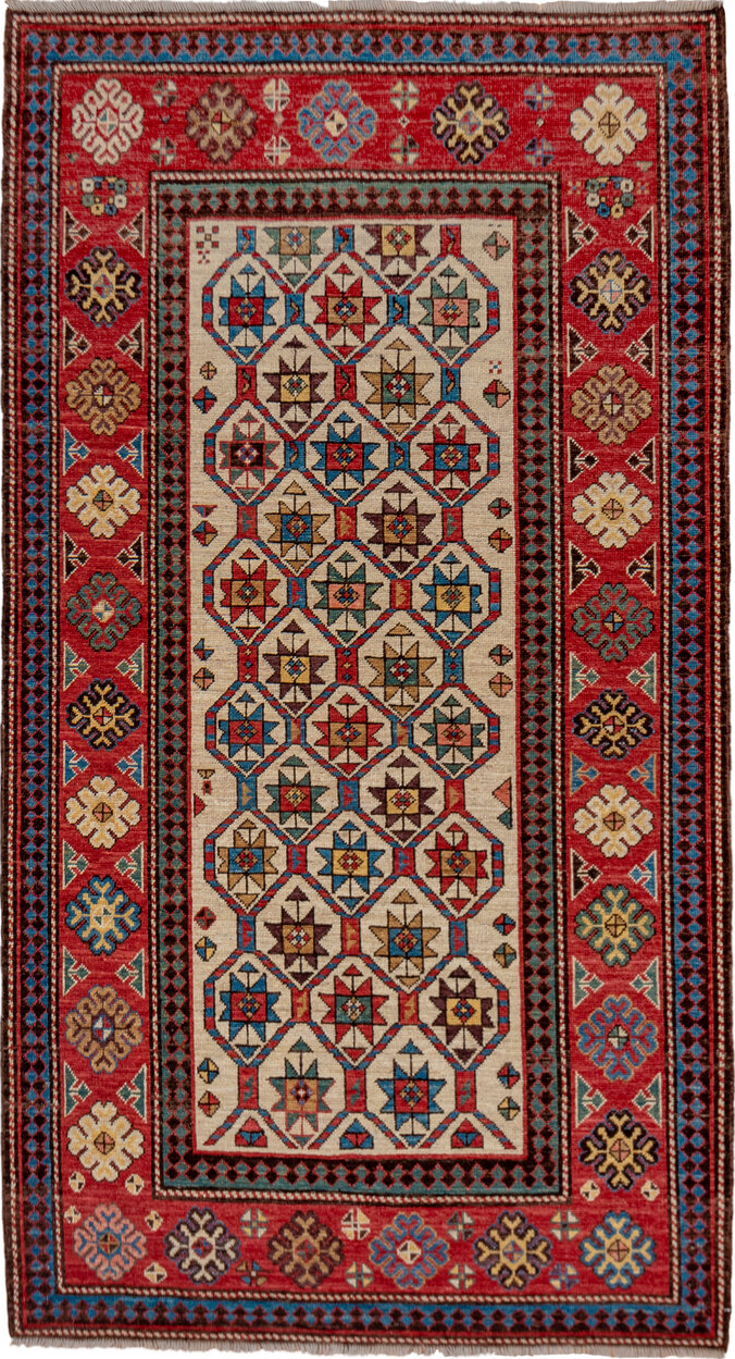 4' x 7' one-of-a-kind handmade vintage Kazak rug. Color palette: arapawa, black, blue, brown, gray, off-white, orange, pink