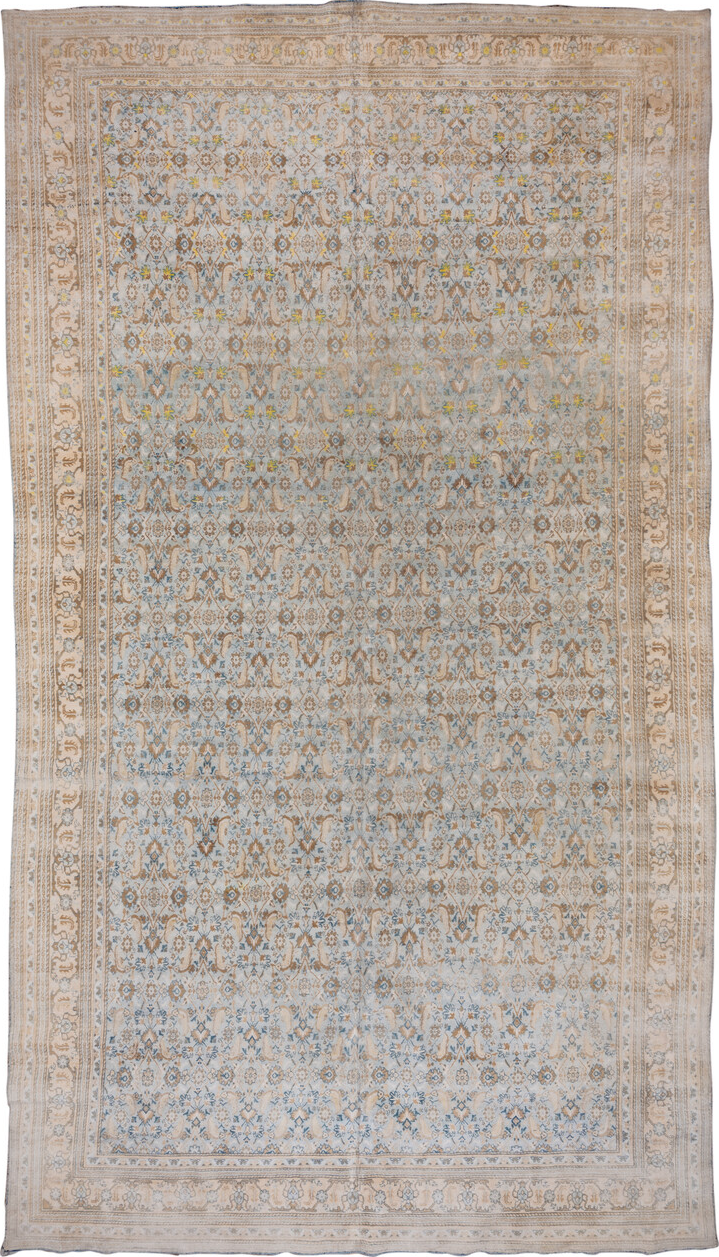 9' x 17' one-of-a-kind handmade vintage Agra rug. Color palette: blue, brown, dark gray, gray, light gray, off-white, orange