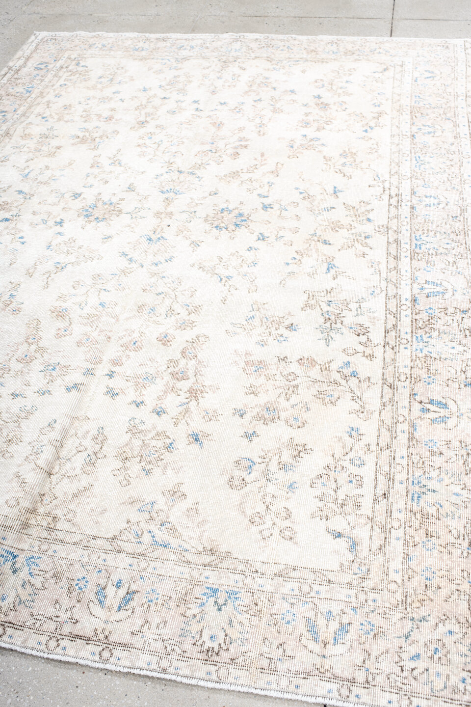 6' x 9' one-of-a-kind handmade vintage Sparta medium size rug. Color palette: gray, light gray, off-white, light blue, brown