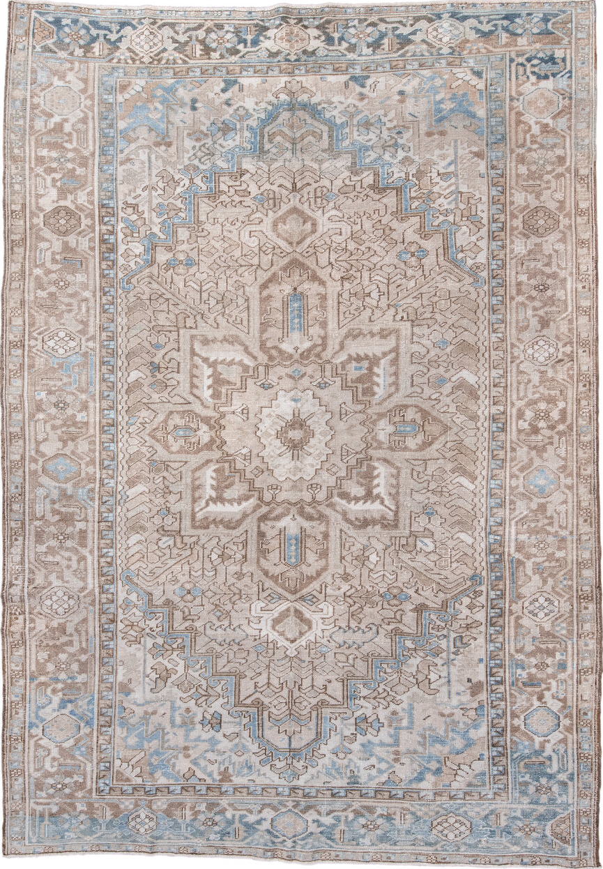 7' x 11' one-of-a-kind handmade vintage Heriz large size rug. Color palette: black, blue, brown, dark gray, floral white