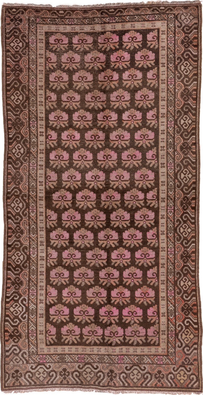4' x 9' one-of-a-kind handmade vintage Khotan rug. Color palette: brown, gray, pink, redwood