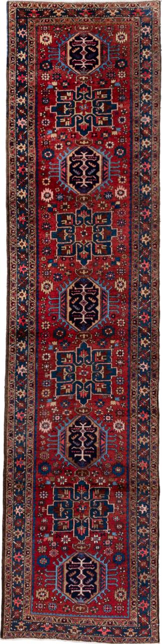 2' x 11' one-of-a-kind handmade vintage Heriz runner rug. Color palette: blue, brown, gray, pink, red