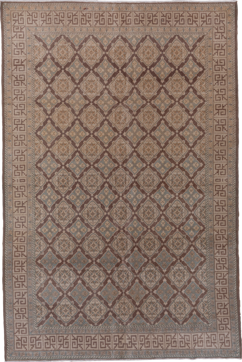5' x 8' one-of-a-kind handmade vintage Sivas medium size rug. Color palette: brown, gray, light gray, pink