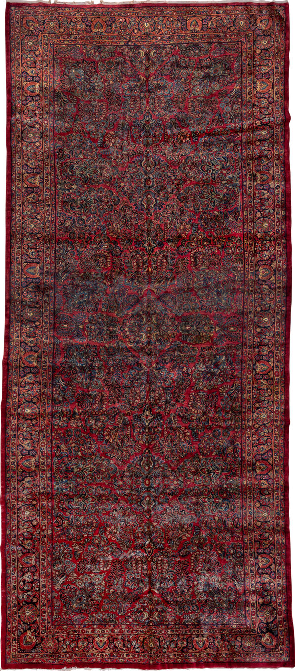10' x 22' one-of-a-kind handmade vintage Sarouk rug. Color palette: black, blue, brown, burgundy, gray, pink, red